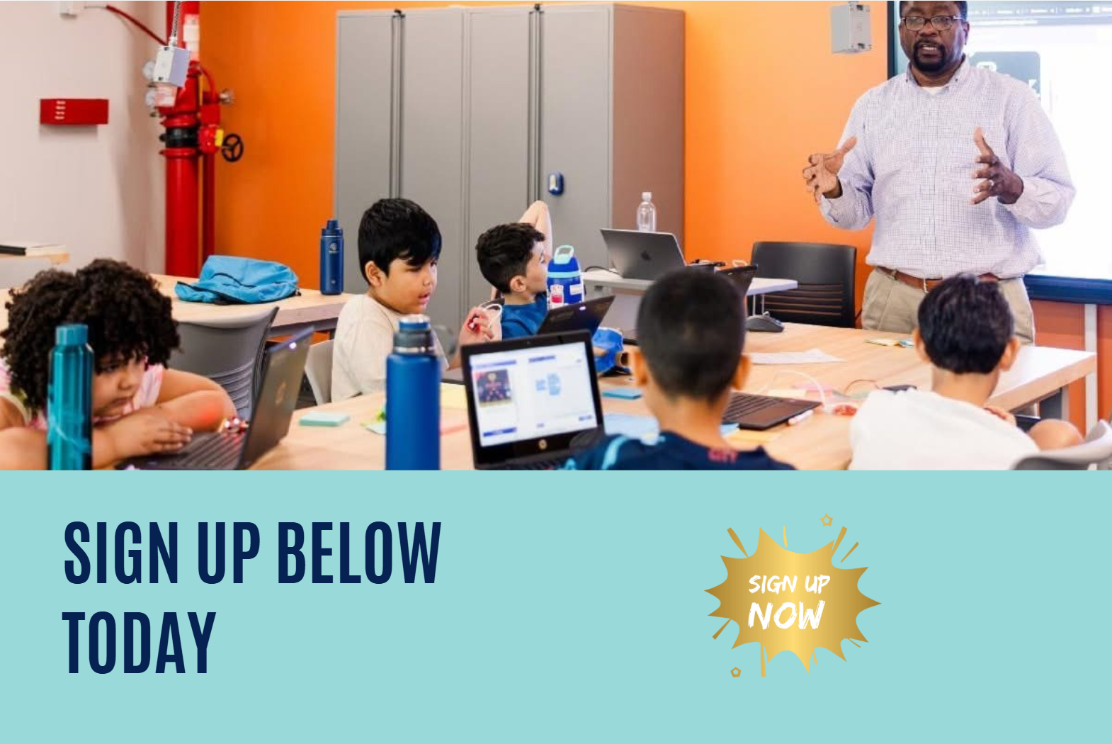 Instructor teaching a tech class: students with laptops at desks as a man explains at the front of a bright classroom with an orange wall; bottom overlay reads 'SIGN UP BELOW TODAY' and a 'SIGN UP NOW' badge.